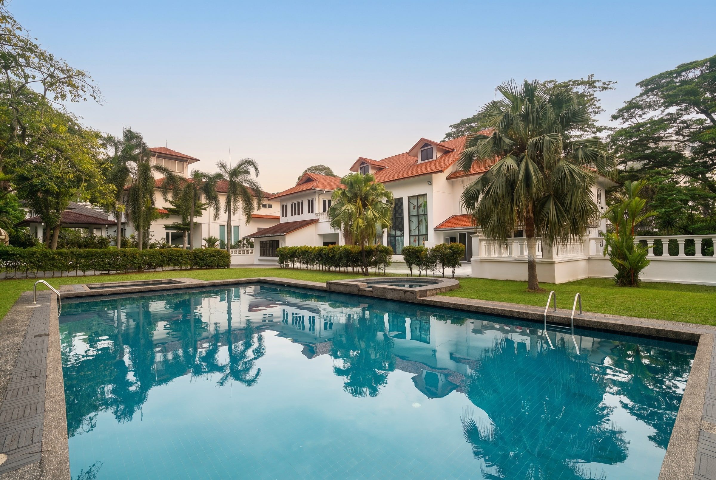 Landscaped garden and pool at Trivelle Care's Country Heights grounds